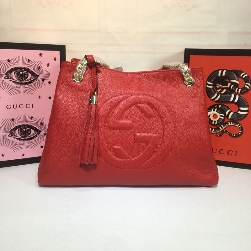 G*u*i top handle bags